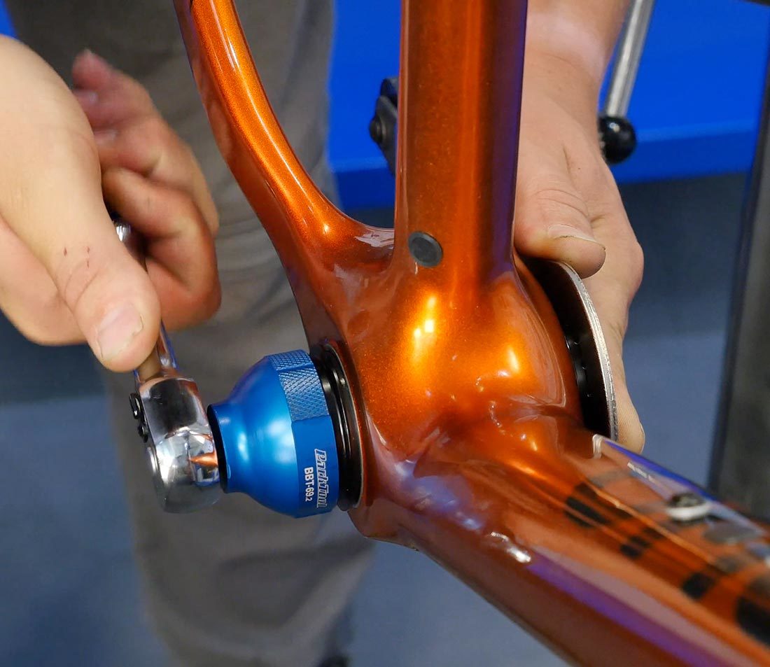 BBT-69.2 on a socket loosening one half of thread through bottom bracket with BBT-9 securing opposite side