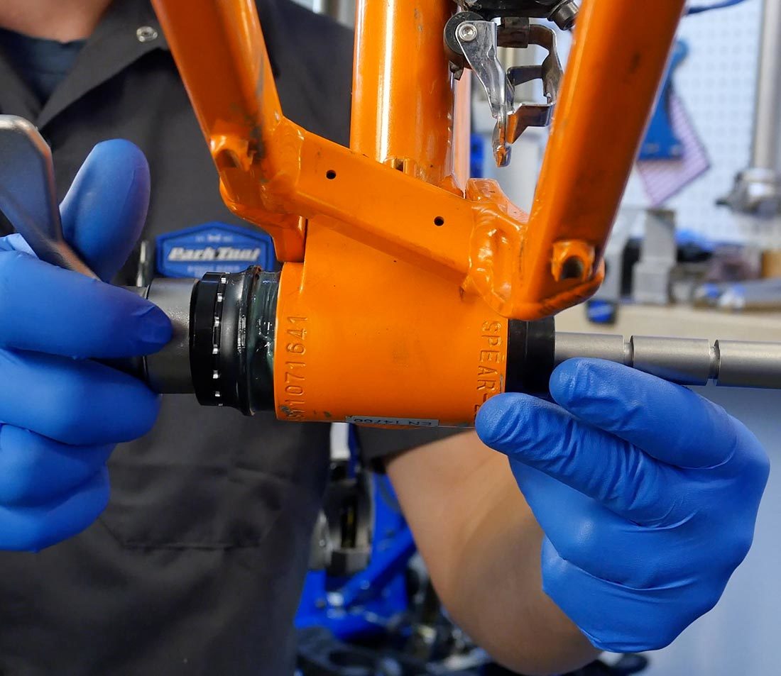 BBP-1.2 bottom bracket press inserted into bottom bracket shell and installing non-drive side cup