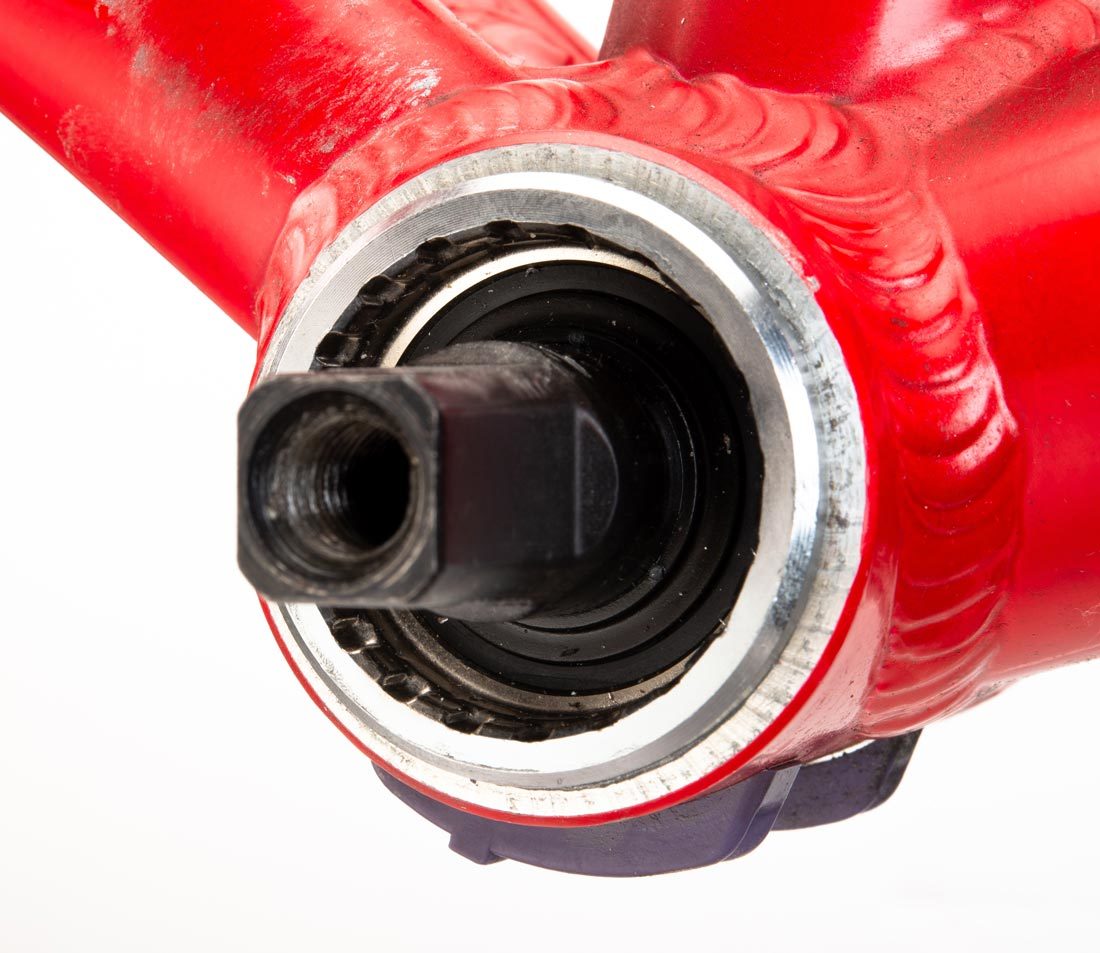 Cartridge bottom bracket with 20 internal splines and square spindle, installed in bottom bracket shell
