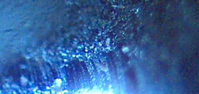 Steel ball bearing outer surface viewed at 200X
