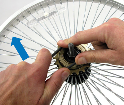 Turn freewheel cone clockwise