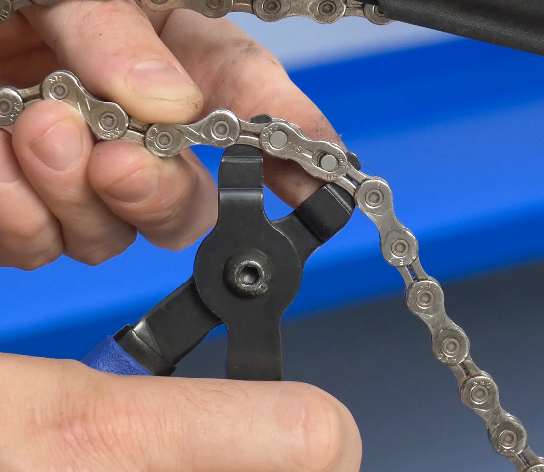 Use Master Link Pliers to remove this type