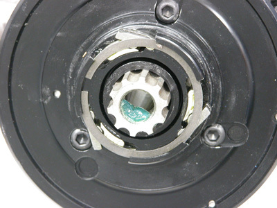 Pawls of collar assembly are out and able to engage ratchet gear of crank