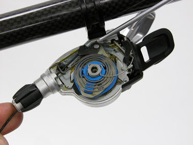 Remove cable head from shift lever