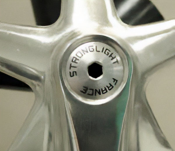 Dust cap hiding bolt beneath