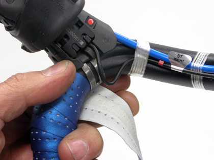 Figure 12. Wrap any excess wrap close to lever when possible
