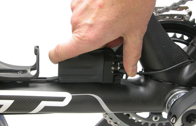 Figure 23. Install battery into bracket and close lever