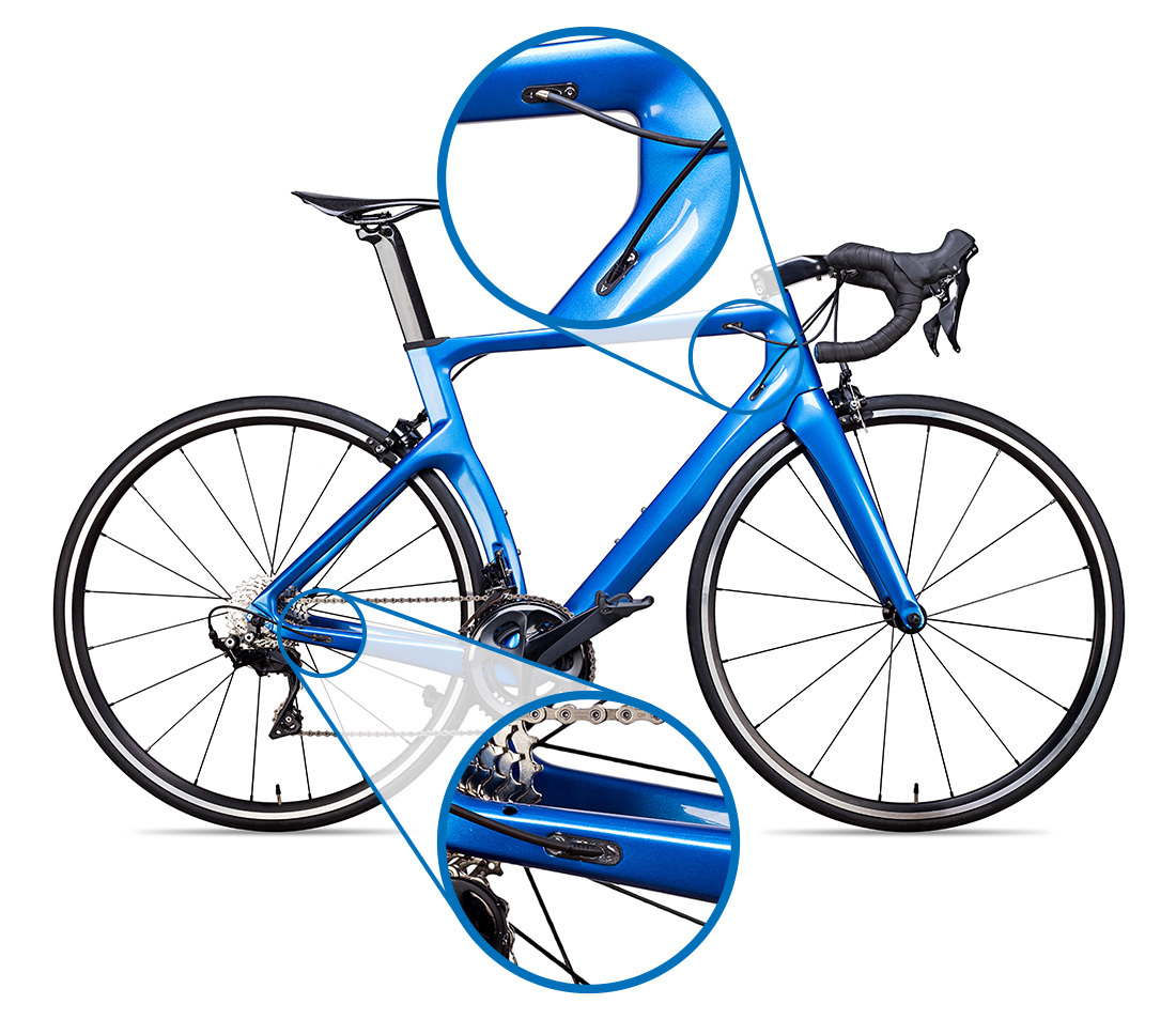 Bicycle with internally-routed housing. The frame features specially-engineered holes for routing the housing through
