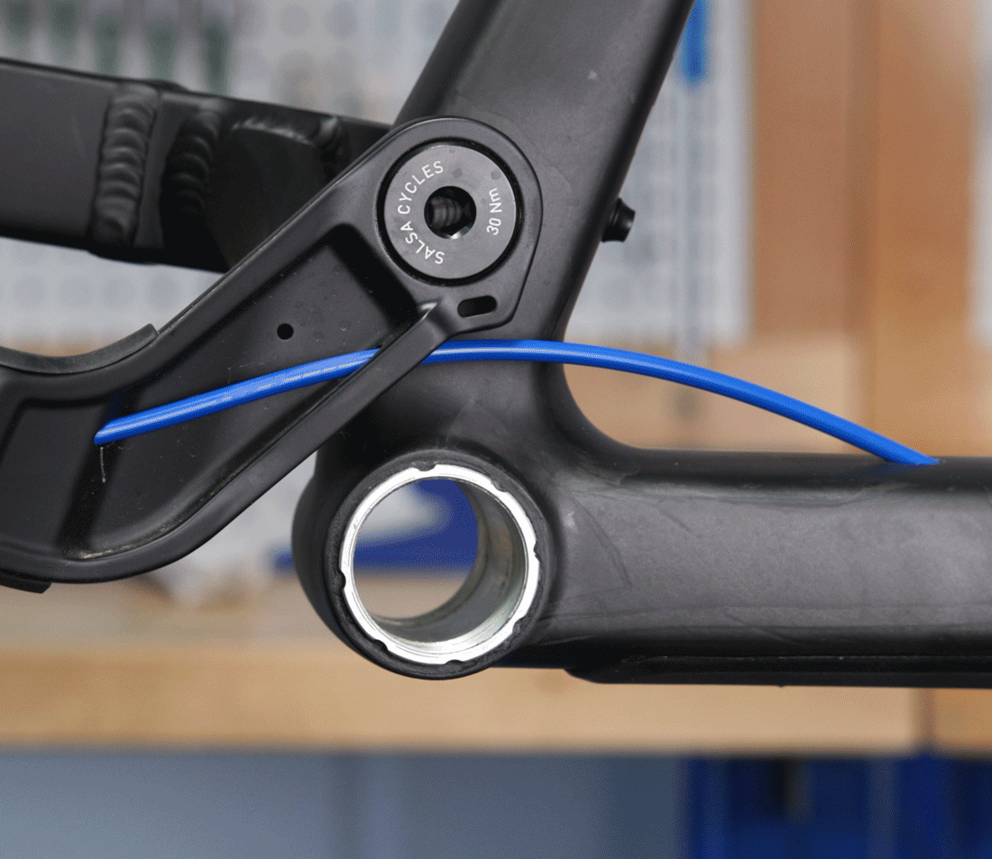 Verify that the housing won't kink or pull at any point in the suspension travel