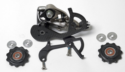 Pulleys and cage plate of SRAM® Force derailleur.