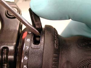 Pry clip back to access wire end
