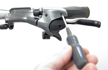 Remove cable cover screw