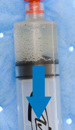 Figure 1. Pull back on plunger to reveal air in fluid