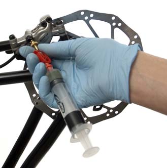 Figure 2. Install syringe at caliper