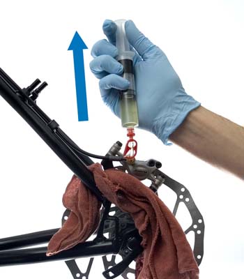 Figure 4. Pull back on plunger to draw any air from the caliper body