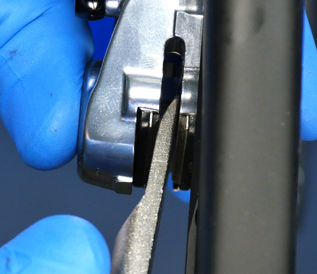 PP-1.2 being used to spread brake pads in hydraulic caliper in preparation for bleed blocks