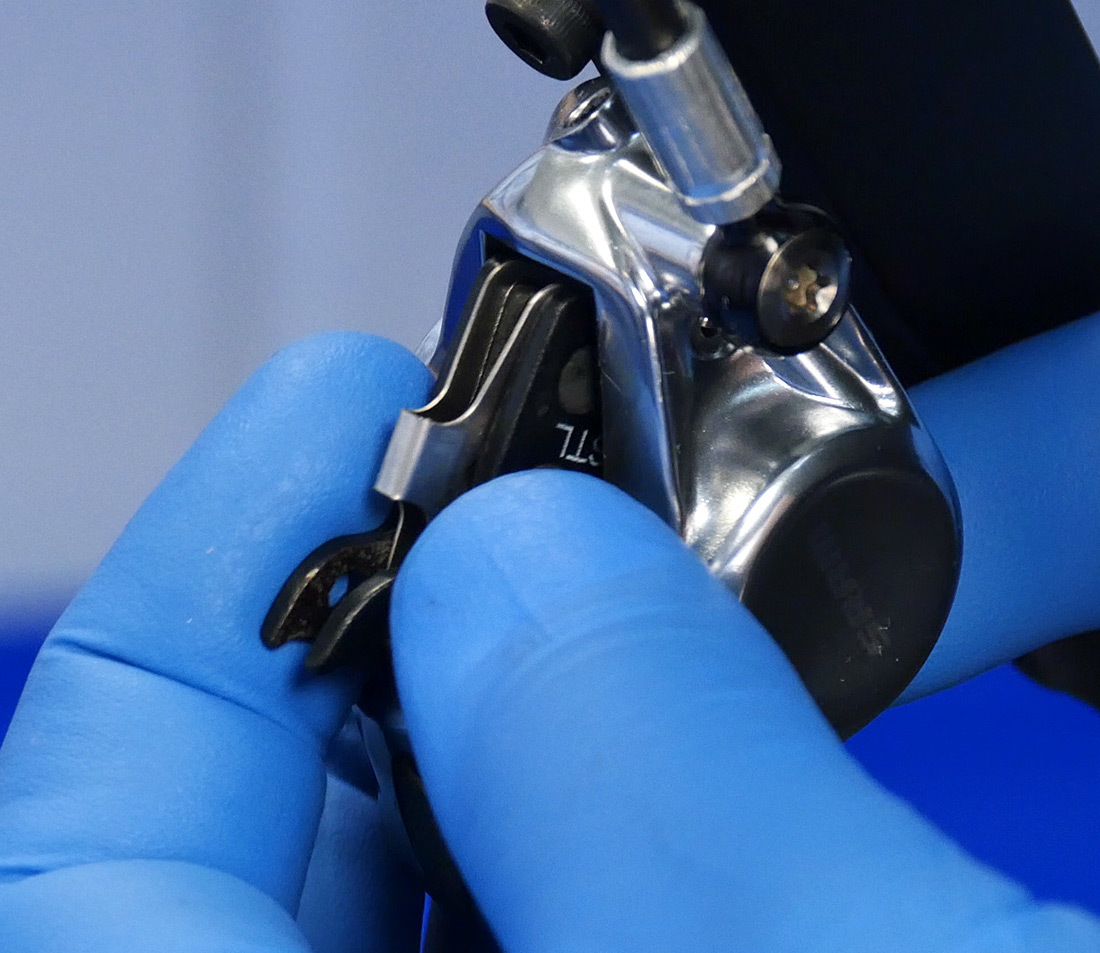 Removing brake pads from hydraulic brake caliper by hand