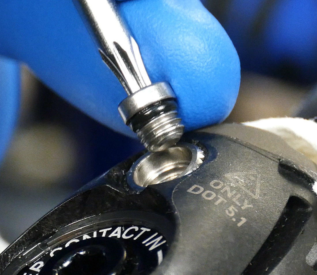 Closeup of O-ring on bleed bolt after removed from brake lever bleed port
