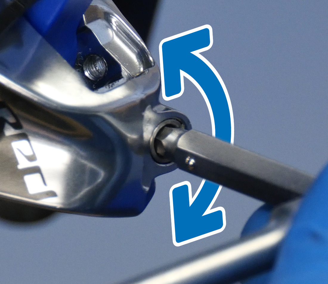 Closeup of brake caliper with Bleeding Edge port being loosened and retightened by a hex wrench