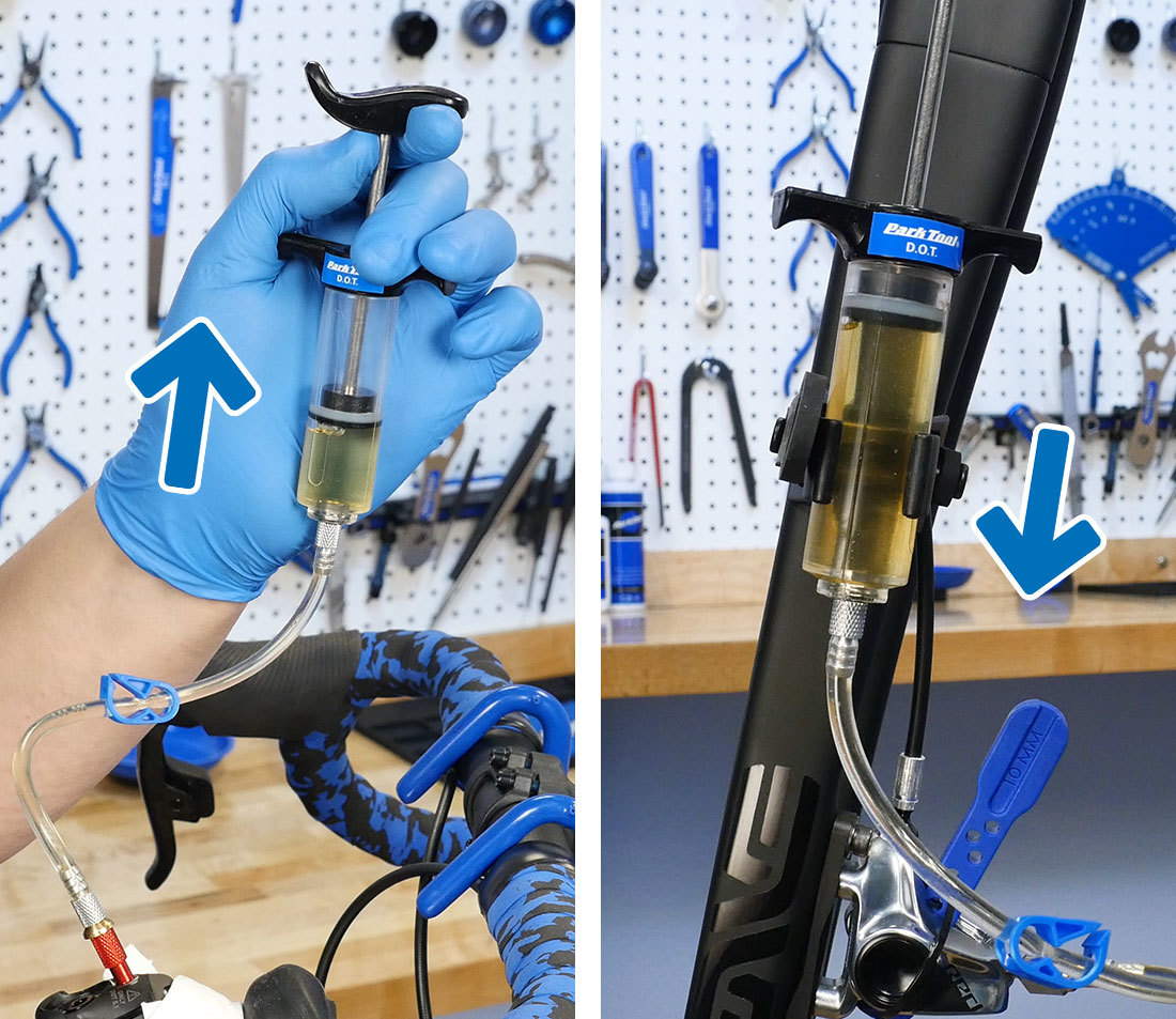 Upper syringe pulling up plunger to draw air bubbles out of system