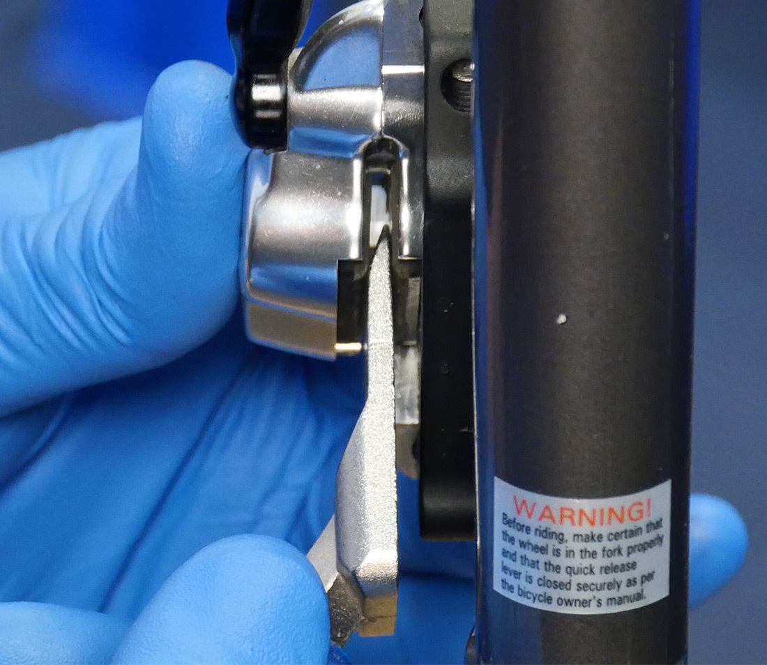 PP-1.2 being used to spread brake pads in hydraulic caliper in preparation for bleed blocks