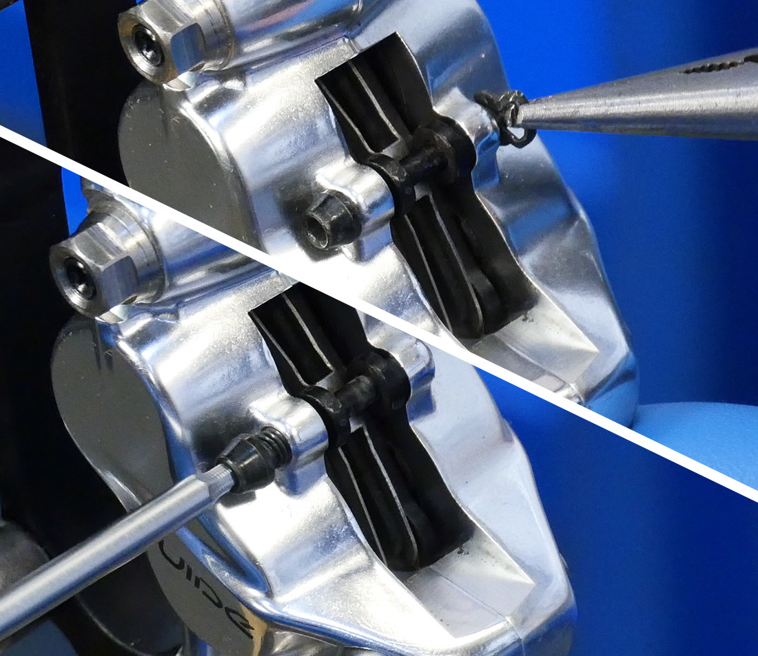 Removing clip and unthreading pin from hydraulic brake caliper with threaded pin