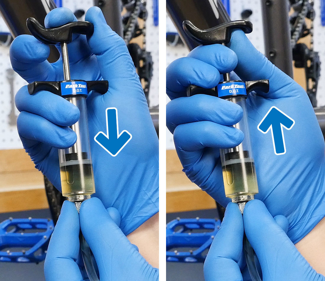 Bleed syringe being held in hand and the plunger pushed, then pulled
