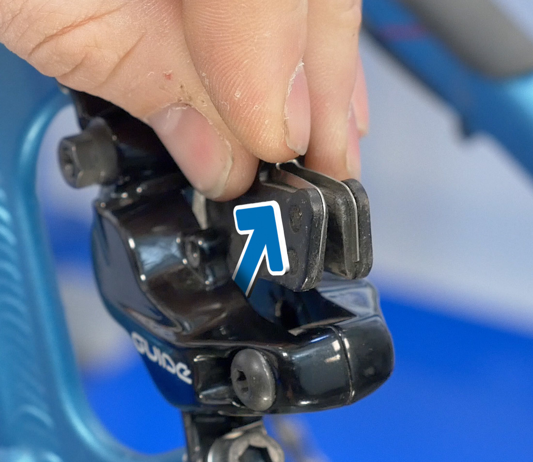 For this design, pads are removed through the top of the caliper