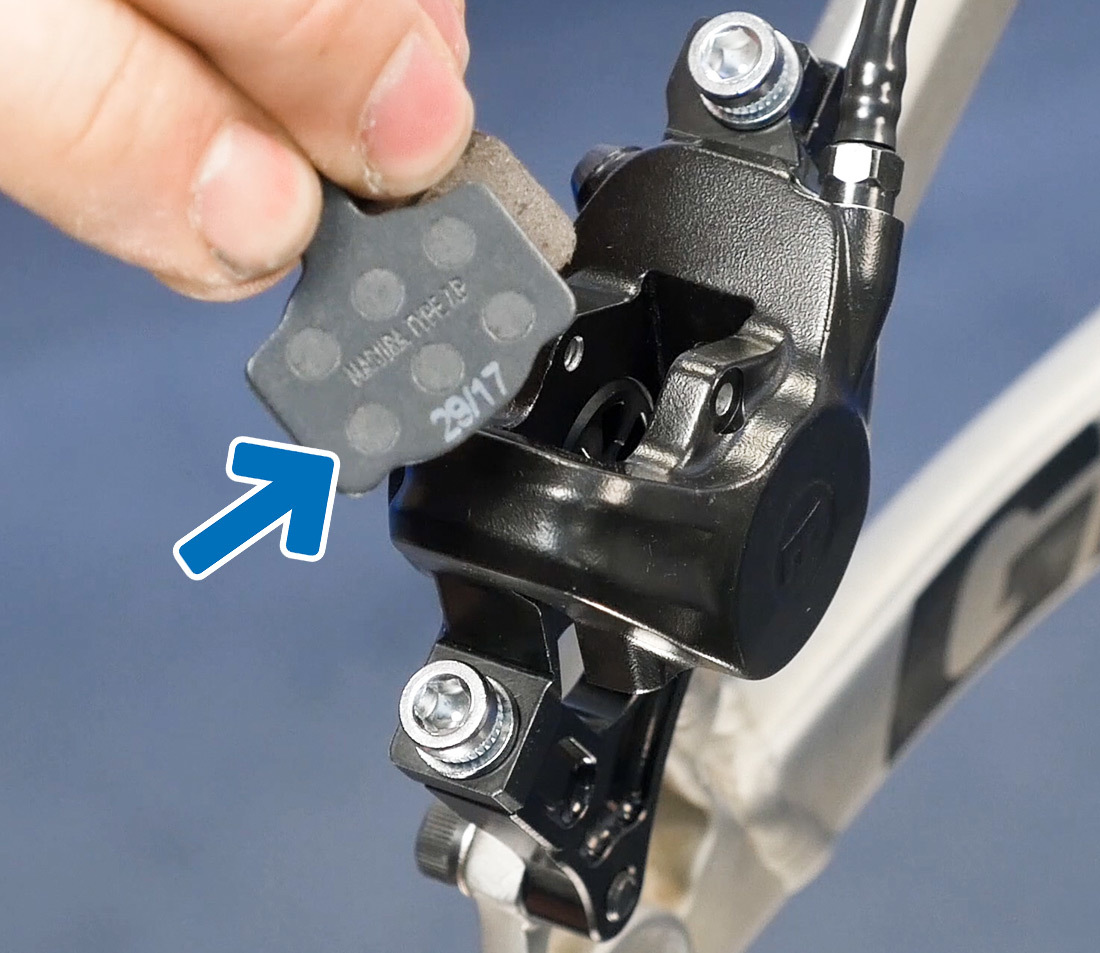 These pads use magnets in conjunction with a retaining pin
