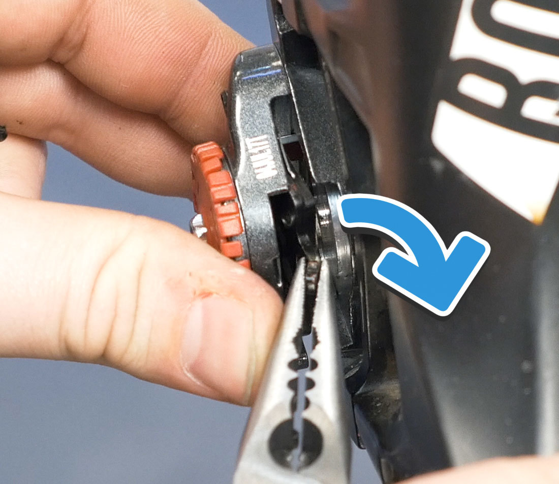 First, push the outer pad to the center and pull to remove