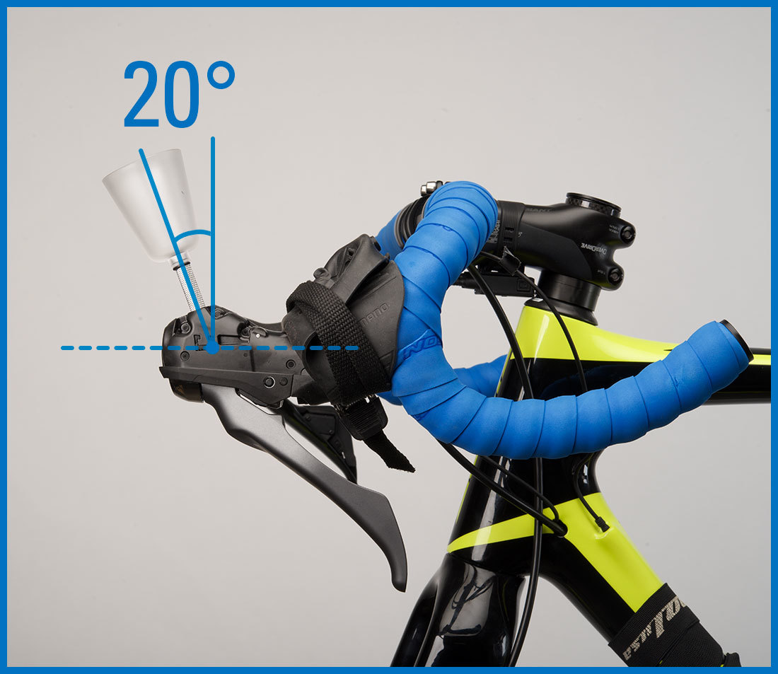 Bleed funnel installed into brake lever with drop handlebars rotated so funnel is 20 degrees from vertical