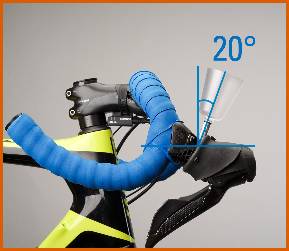 Bleed funnel installed into brake lever with drop handlebars rotated so funnel is 20 degrees from vertical
