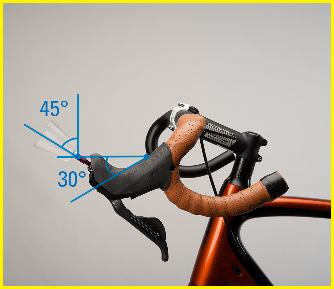 Bleed funnel installed into brake lever with drop bars rotated so funnel is 45 degrees from vertical