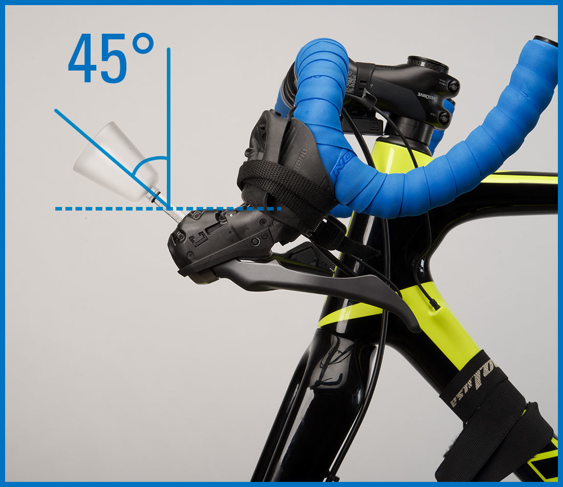 Bleed funnel installed into brake lever with drop handlebars rotated so funnel is 45 degrees from vertical