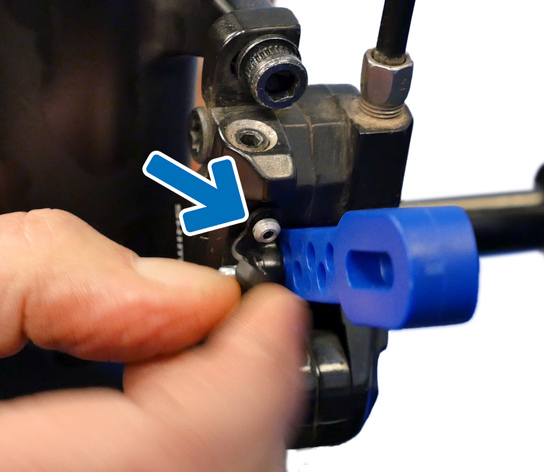 This caliper bleed nipple is located on the side of the caliper body