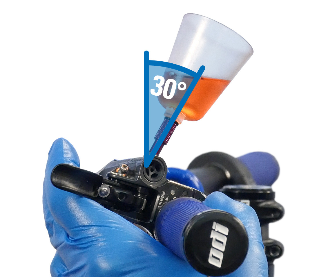 Lever rotated so funnel is 30 degrees back from vertical