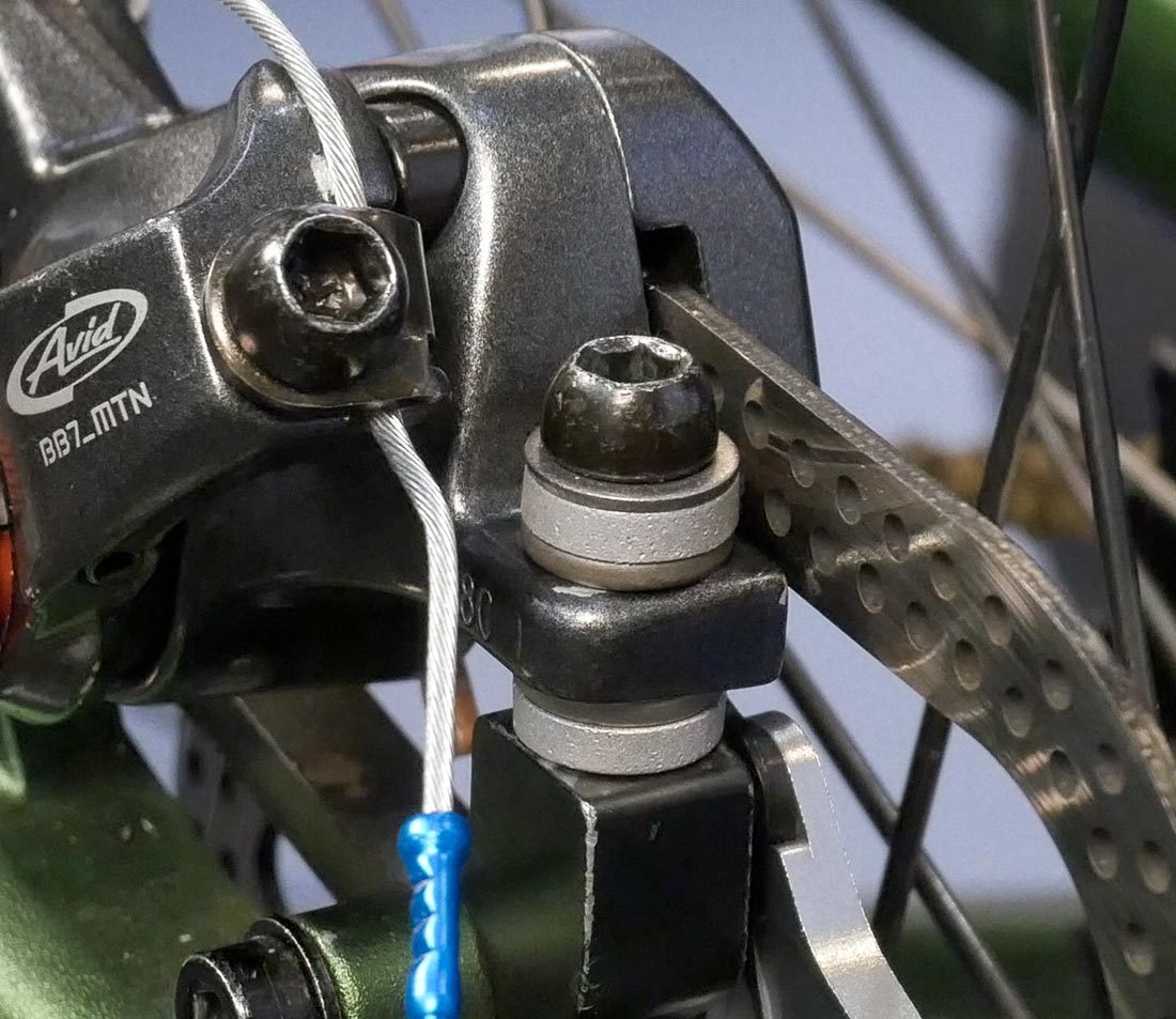 Caliper with Avid CPS conical washer system