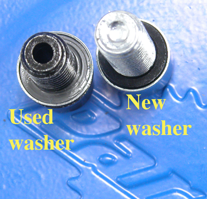 Figure 7. Replace crush washer if a leak develops at the bolt
