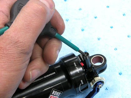 Figure 6. IMPORTANT: Release air pressure from shock