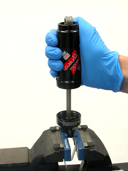 Figure 10. Pull air-can up and off of damper shaft assembly