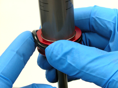Figure 12. Remove O-ring from piston