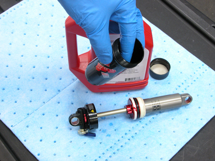 Figure 21. Lubricate inside the air-can and all seal with suspension fluid