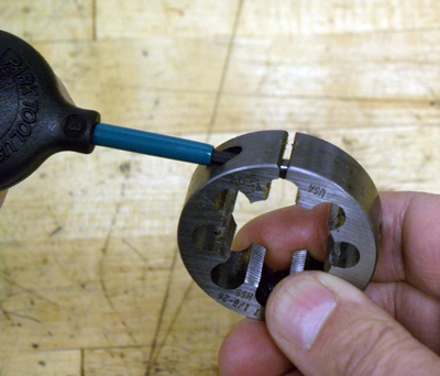 Figure 1. Use hex wrench to turn setscrew in die