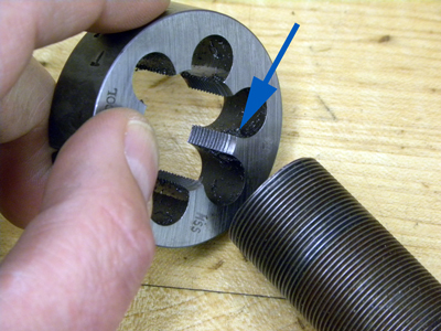 Figure 2. Tapered end of die faces thread or fork