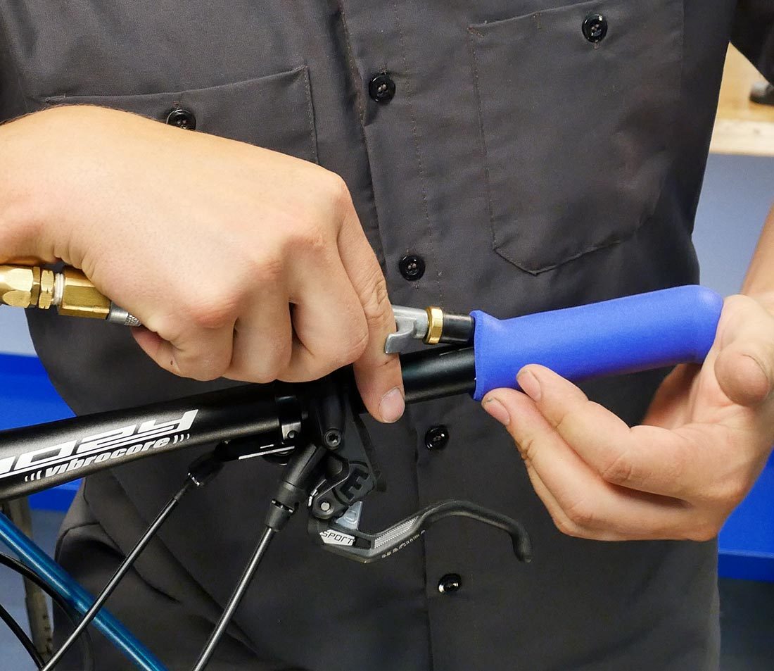 Create an air gap with an air compressor attachment