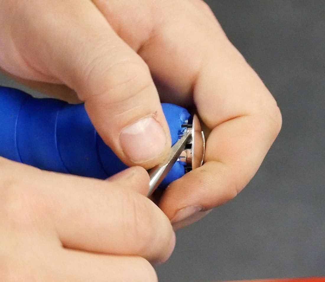 Use screwdriver or similar to pry out bar end plug