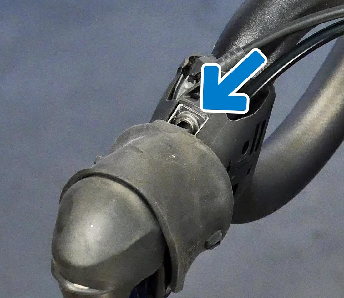 The lever mounting bolt is commonly found on top of the lever
