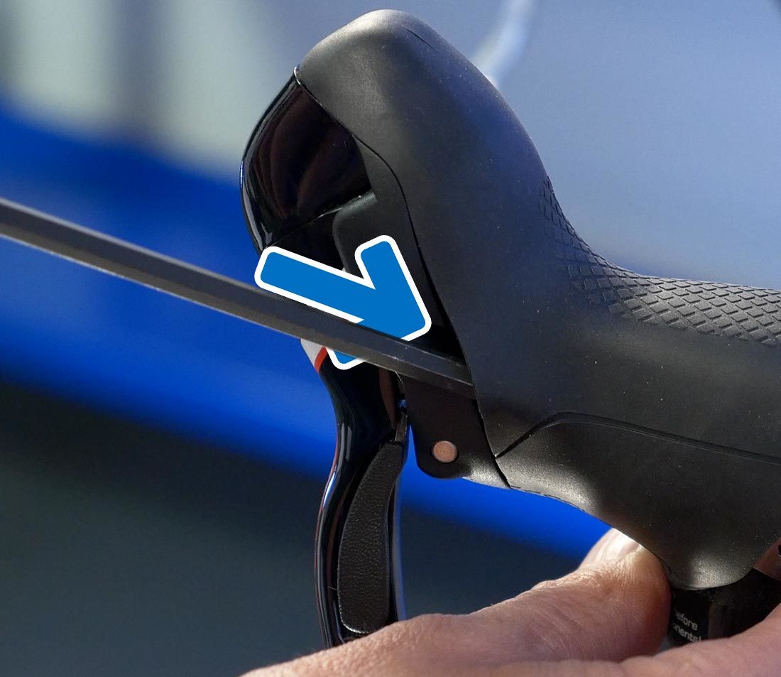 On some models the mounting bolt is accessed through the front of the lever body