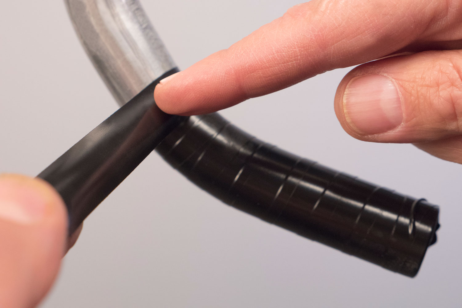 Wrap with electrical tape so the adhesive is outward