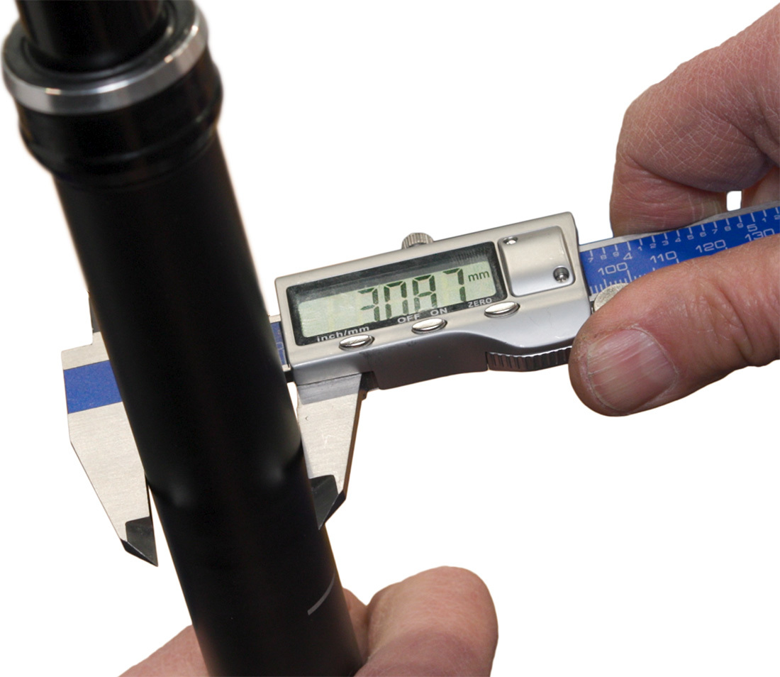 The diameter of this post is reading 30.87, but is rounded to 30.9.